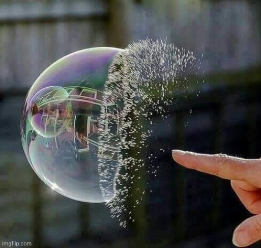 Popping a Bubble in Slo Mo | image tagged in slow motion,bubble,popping,awesome,pic | made w/ Imgflip meme maker