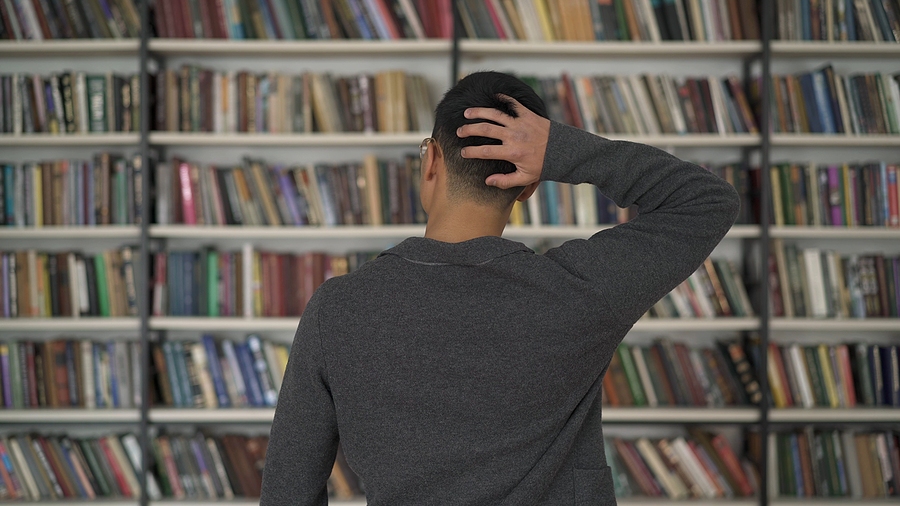 High Quality Confused man in library Blank Meme Template