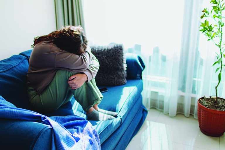 crying depressed woman on sofa Blank Meme Template