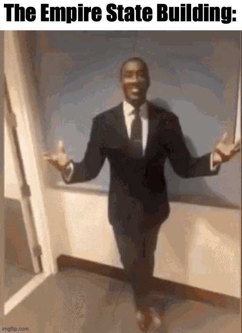 smiling black guy in suit | The Empire State Building: | image tagged in smiling black guy in suit | made w/ Imgflip meme maker
