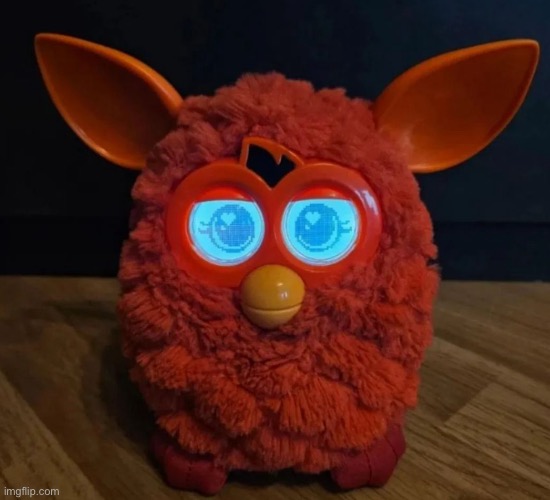 This looks like if the 2012 furby and the furby boom had a child | made w/ Imgflip meme maker