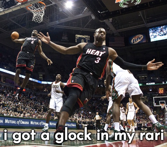 Lebron Dunking | i got a glock in my rari | image tagged in lebron dunking | made w/ Imgflip meme maker