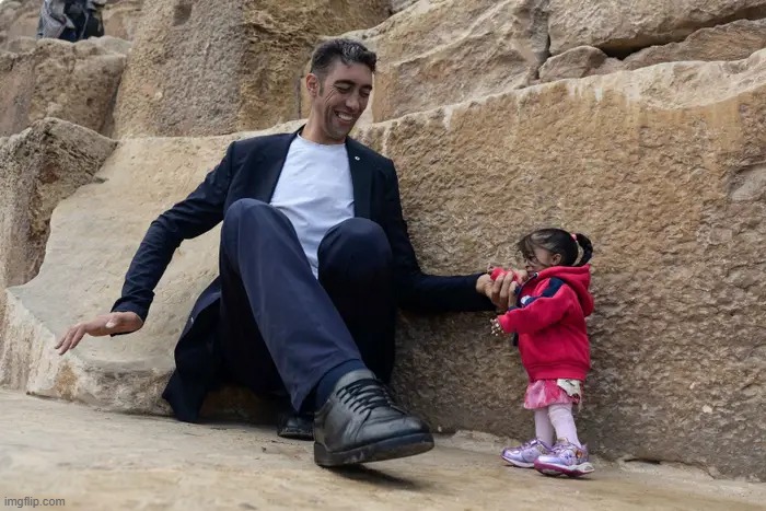 the tallest man and the shortest woman | made w/ Imgflip meme maker