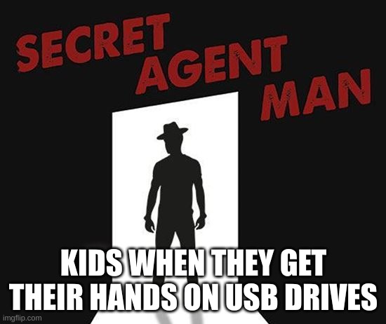 Secret agent | KIDS WHEN THEY GET THEIR HANDS ON USB DRIVES | image tagged in secret agent | made w/ Imgflip meme maker