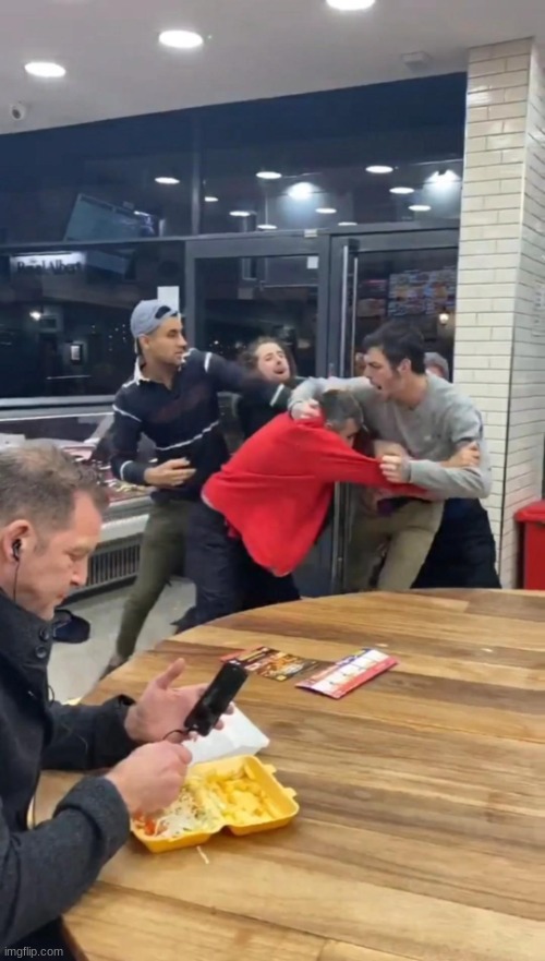 . | image tagged in guy chilling while fight happens | made w/ Imgflip meme maker
