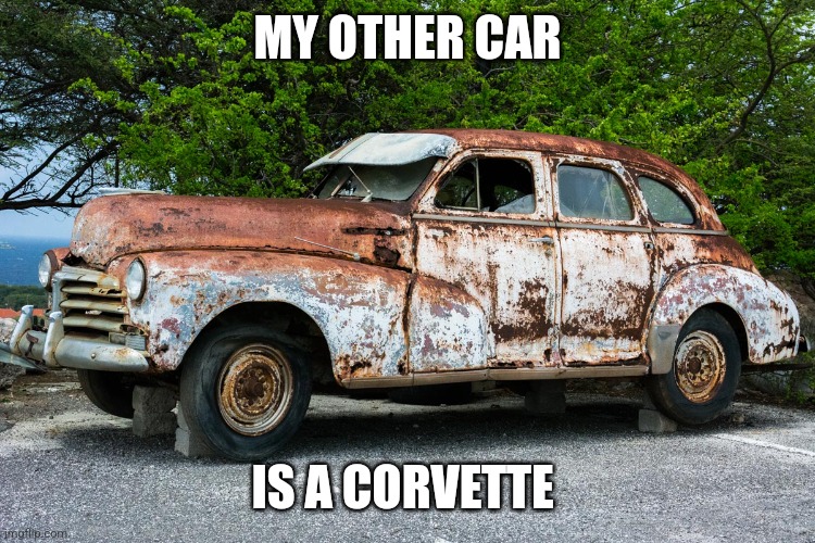 My other car | MY OTHER CAR; IS A CORVETTE | image tagged in junk car,funny memes | made w/ Imgflip meme maker