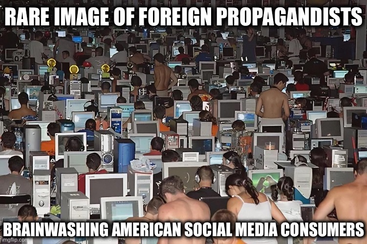 Meanwhile, in a Cyber Cafe in Eastern Europe . . . | RARE IMAGE OF FOREIGN PROPAGANDISTS; BRAINWASHING AMERICAN SOCIAL MEDIA CONSUMERS | image tagged in psyops,wwiii,propaganda,american politics,european union | made w/ Imgflip meme maker