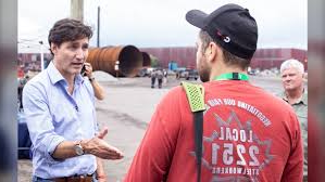 Justine Trudeau talks to man Blank Meme Template