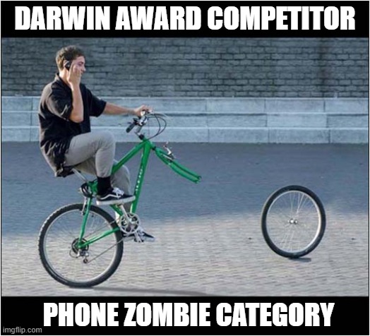 Any Moment Now ... | DARWIN AWARD COMPETITOR; PHONE ZOMBIE CATEGORY | image tagged in cyclist,darwin award,phone zombie,dark humour | made w/ Imgflip meme maker