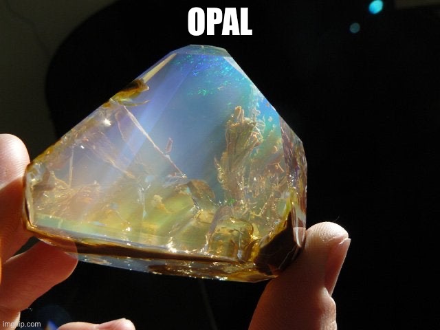 Ethiopian Welo Opal New gem found looks like the ocean in rock | OPAL | image tagged in ethiopian welo opal new gem found looks like the ocean in rock | made w/ Imgflip meme maker