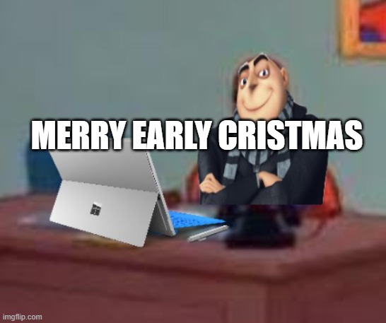 Gru at a desk with a Microsoft Surface | MERRY EARLY CRISTMAS | image tagged in gru at a desk with a microsoft surface | made w/ Imgflip meme maker