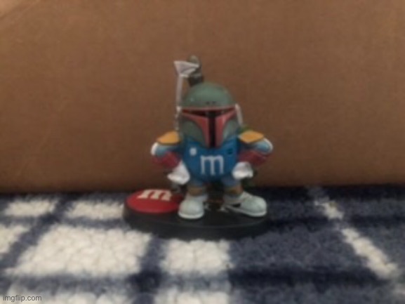 Here’s a cool Boba Fett M&M figure that I got for Christmas :) | made w/ Imgflip meme maker