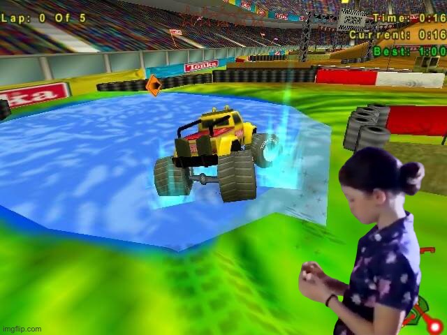 Amanda Plays Tonka Monster Trucks | image tagged in girl,pretty girl,vehicle,beautiful girl,computer games,2000s | made w/ Imgflip meme maker