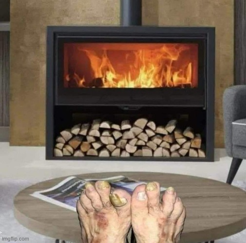 Warming My Feet by the Fireplace | image tagged in vince vance,cursed image,fireplace,mangled,toes,toasty | made w/ Imgflip meme maker