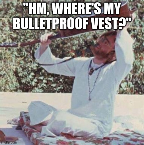 Hmmm I wonder where it is | "HM, WHERE'S MY BULLETPROOF VEST?" | image tagged in john lennon searching,john lennon,the beatles | made w/ Imgflip meme maker