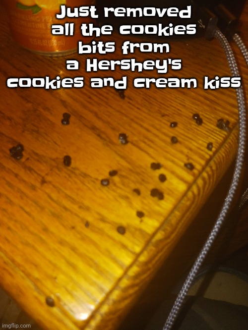 Just removed all the cookies bits from a Hershey's cookies and cream kiss | made w/ Imgflip meme maker