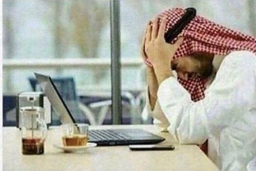 Arab facepalming in front of computer Blank Meme Template