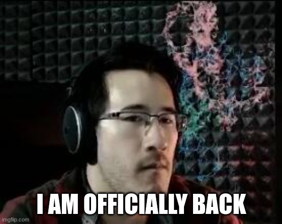 Markiplier not impressed | I AM OFFICIALLY BACK | image tagged in markiplier not impressed | made w/ Imgflip meme maker