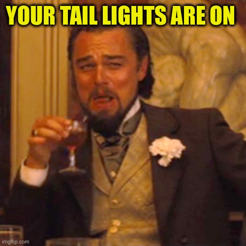 Laughing Leo Meme | YOUR TAIL LIGHTS ARE ON | image tagged in memes,laughing leo | made w/ Imgflip meme maker