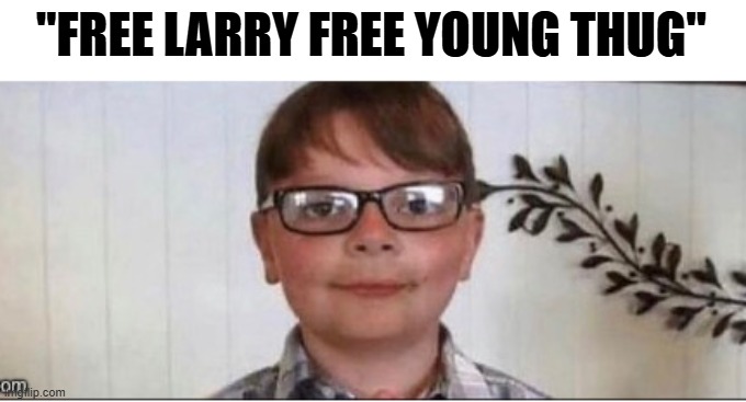 nerd | "FREE LARRY FREE YOUNG THUG" | image tagged in nerd | made w/ Imgflip meme maker