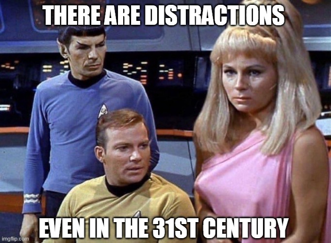 There are distractions | THERE ARE DISTRACTIONS; EVEN IN THE 31ST CENTURY | image tagged in star trek,funny,distractions,captain kirk,mr spock,boobs | made w/ Imgflip meme maker