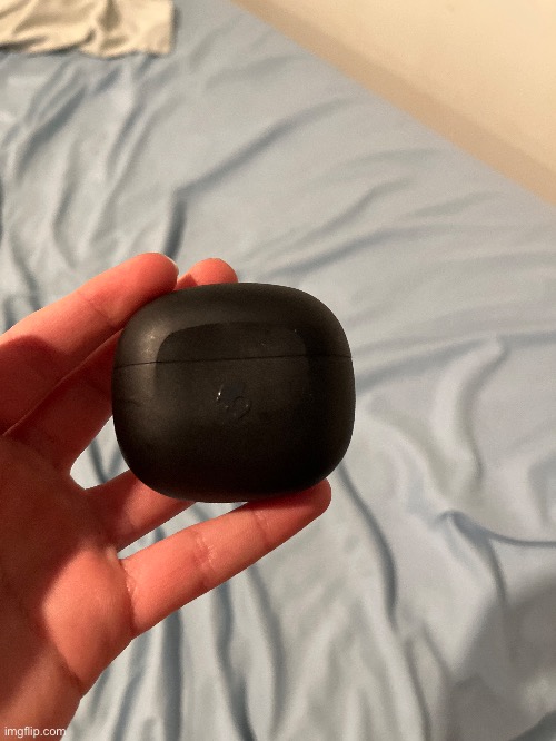 I bet AirPods don’t have a cool skull on the case | made w/ Imgflip meme maker