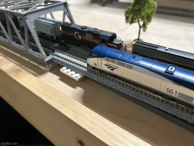 Daily shot from the layout. Amtrak P42DC #161 passes a local freight | image tagged in photography,model trains,hobbies,n scale,trains,msmg | made w/ Imgflip meme maker