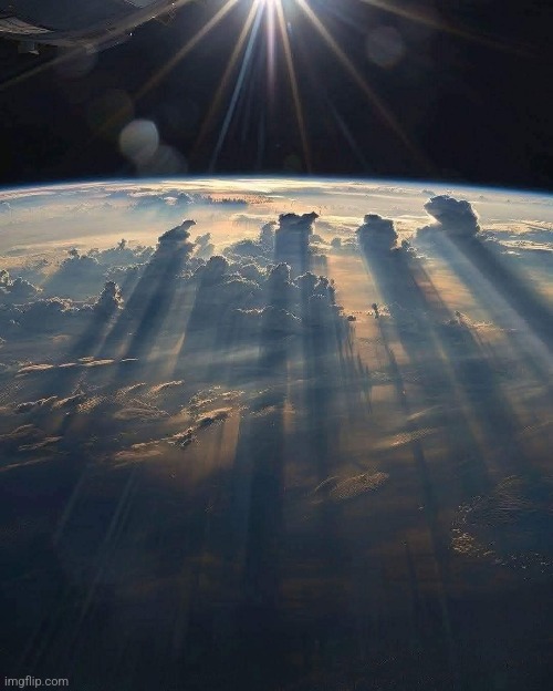 Sun on clouds from ISS | image tagged in space,sunshine,clouds,international space station,awesome,photography | made w/ Imgflip meme maker