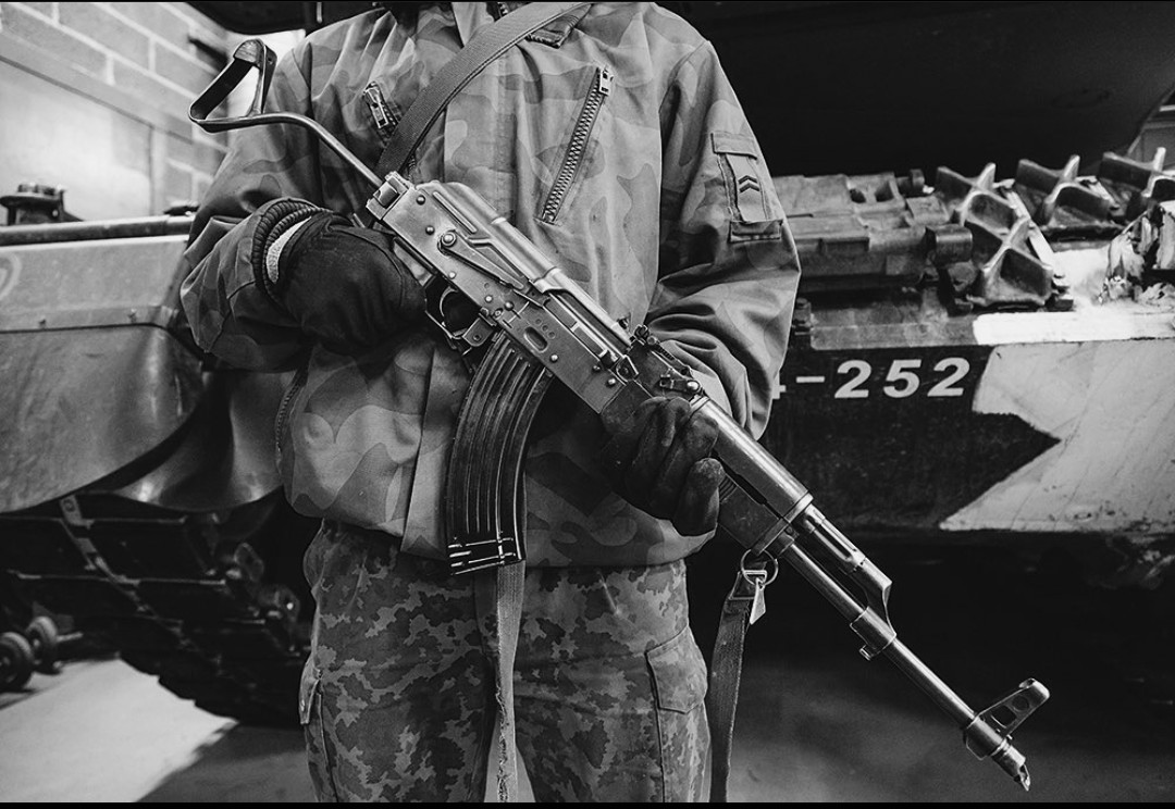 German holding a Ak-47 Blank Meme Template