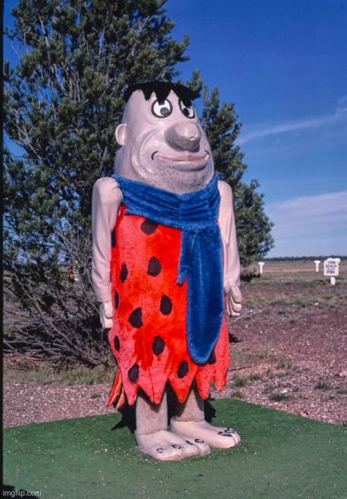 Fred Flintstone statue | image tagged in fred flintstone,balls | made w/ Imgflip meme maker