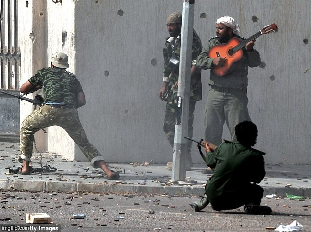 The Uniparty Swamp Loves This Tune ! | image tagged in libyan soldier with guitar,political meme,politics,funny memes,funny | made w/ Imgflip meme maker