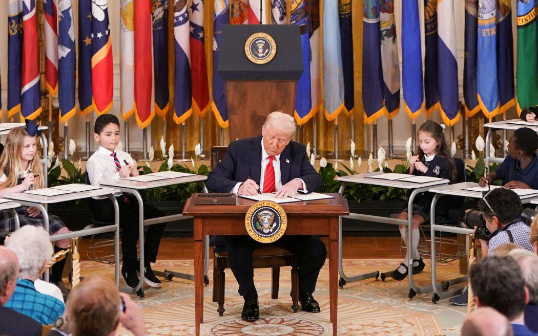 Trump signing executive order by school children Blank Meme Template
