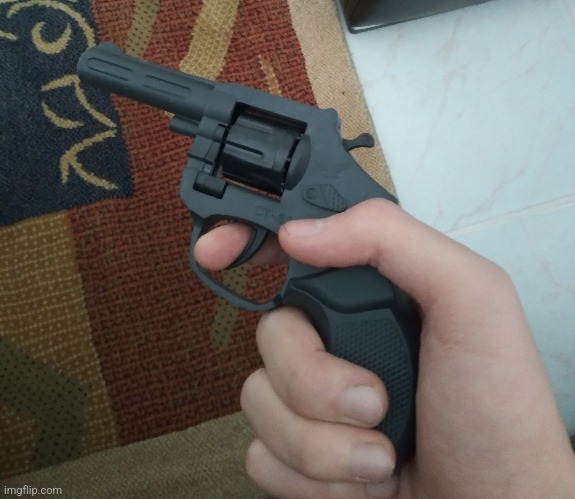 Real gun and it's loaded | made w/ Imgflip meme maker