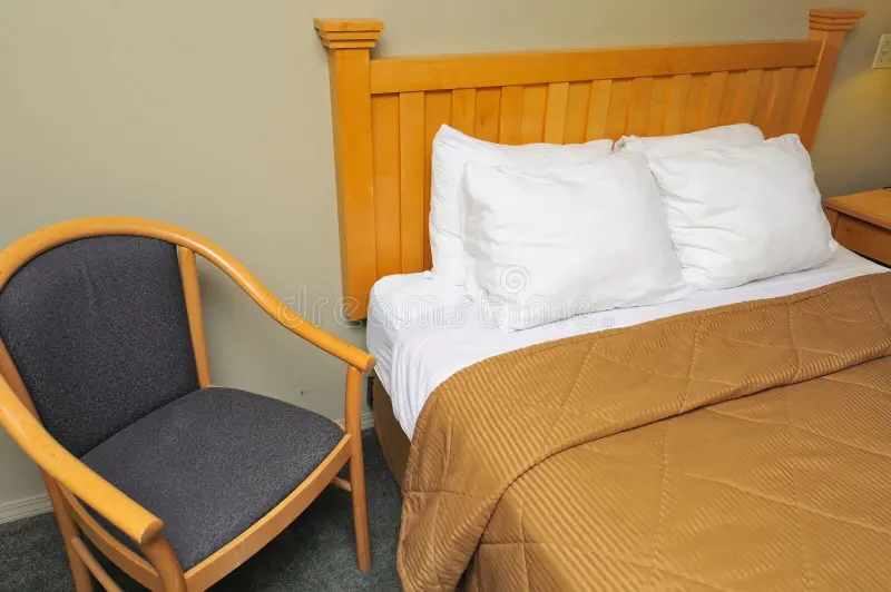 chair facing the bed Blank Meme Template