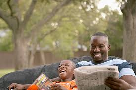 dad reading newspaper kid laughing Blank Meme Template