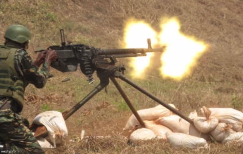 machine gun | image tagged in machine gun | made w/ Imgflip meme maker