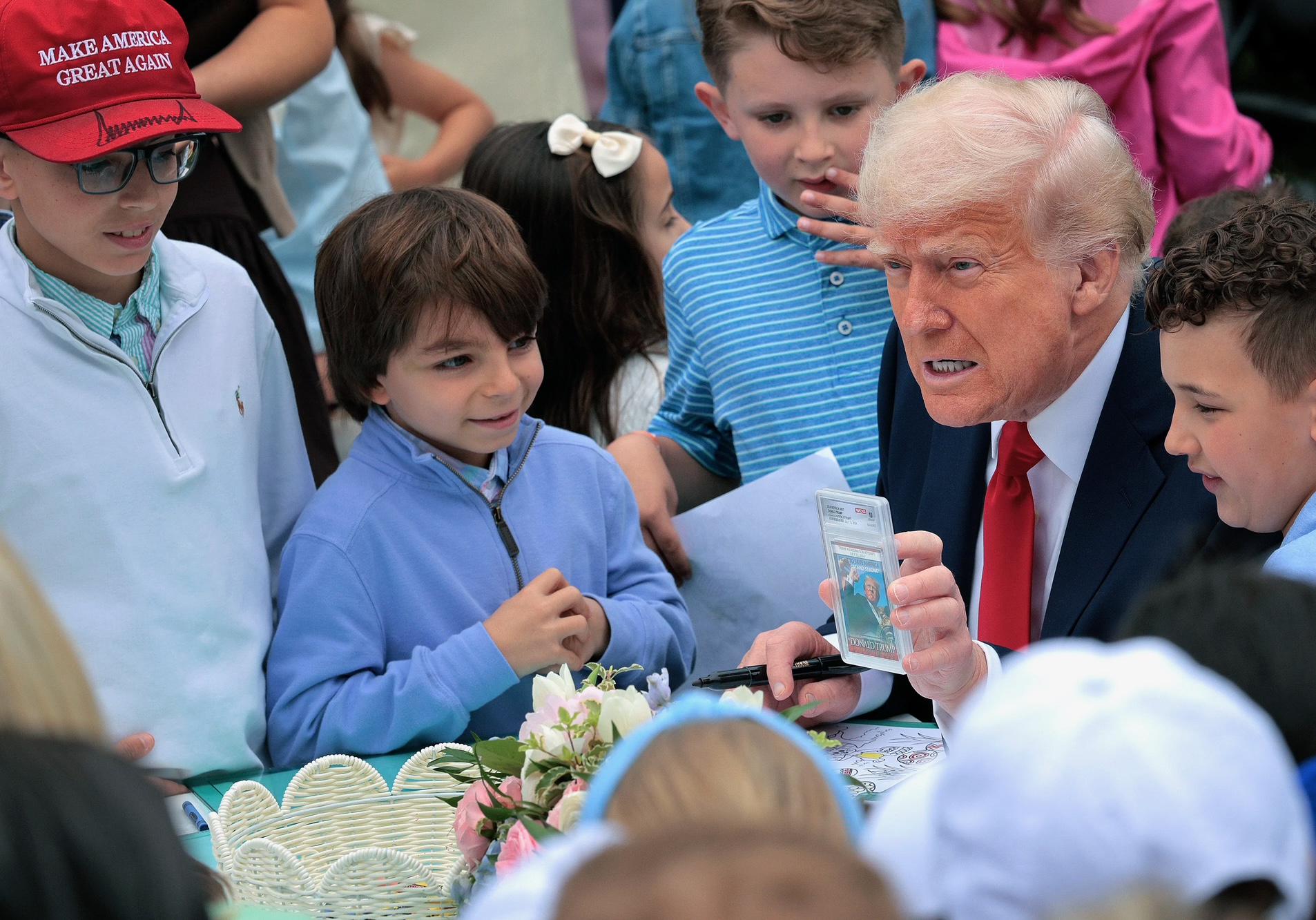 Trump showing card to kids Blank Meme Template