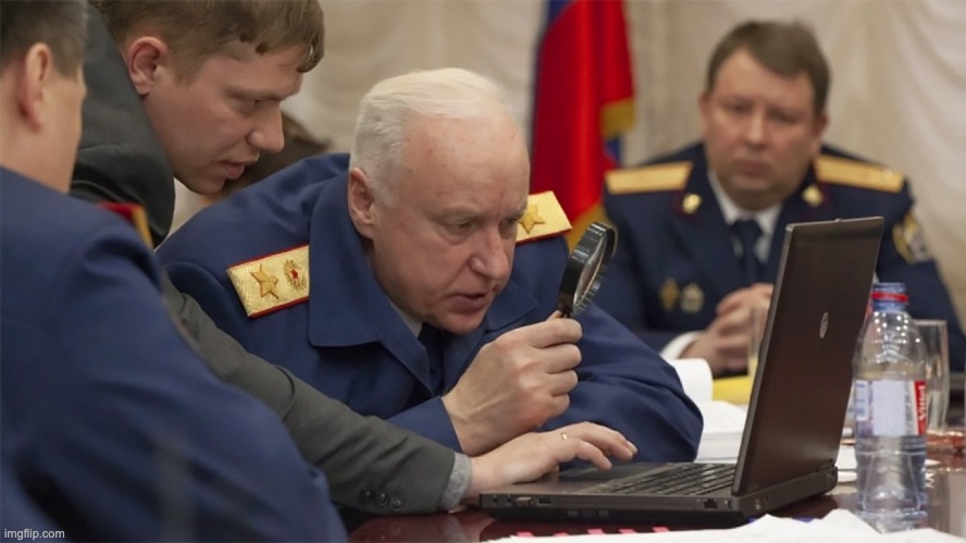 Russian general looking at laptop with magnifying glass | image tagged in russian general looking at laptop with magnifying glass | made w/ Imgflip meme maker