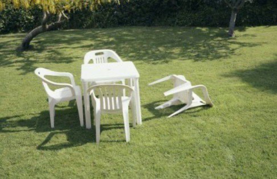 Patio set with chair overturned Blank Meme Template