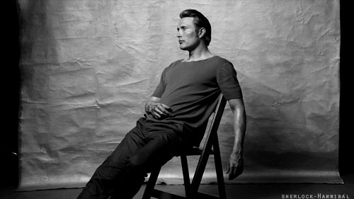 Mads Mikkelsen in a Chair Blank Meme Template