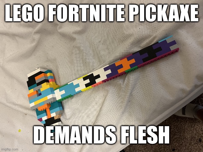 Fortnite lego | LEGO FORTNITE PICKAXE; DEMANDS FLESH | image tagged in fortnite lego | made w/ Imgflip meme maker