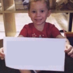 Gavin holding a paper Blank Meme Template