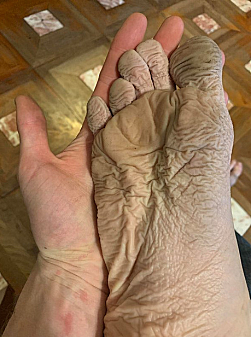 At home with the foot he found washed up on a sandy beach. | image tagged in memes,foot,cursed,fun | made w/ Imgflip meme maker