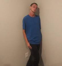 leaning on the wall blue shirt Blank Meme Template