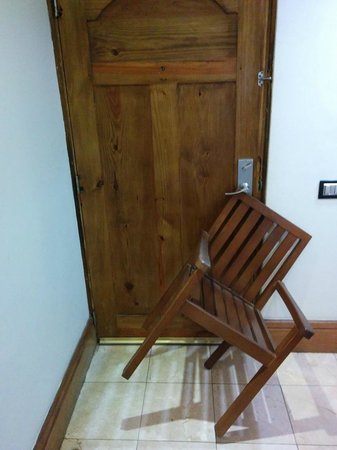 Chair holding door Blank Meme Template