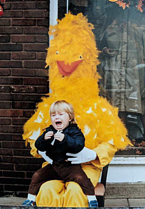 Mom brings child to enjoy another unknown holiday while man in raincoat watches from window. | made w/ Imgflip meme maker