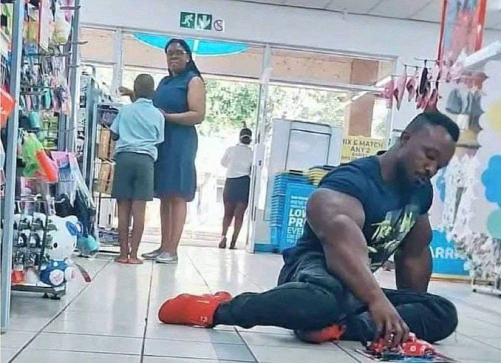 black man playing with a car Blank Meme Template
