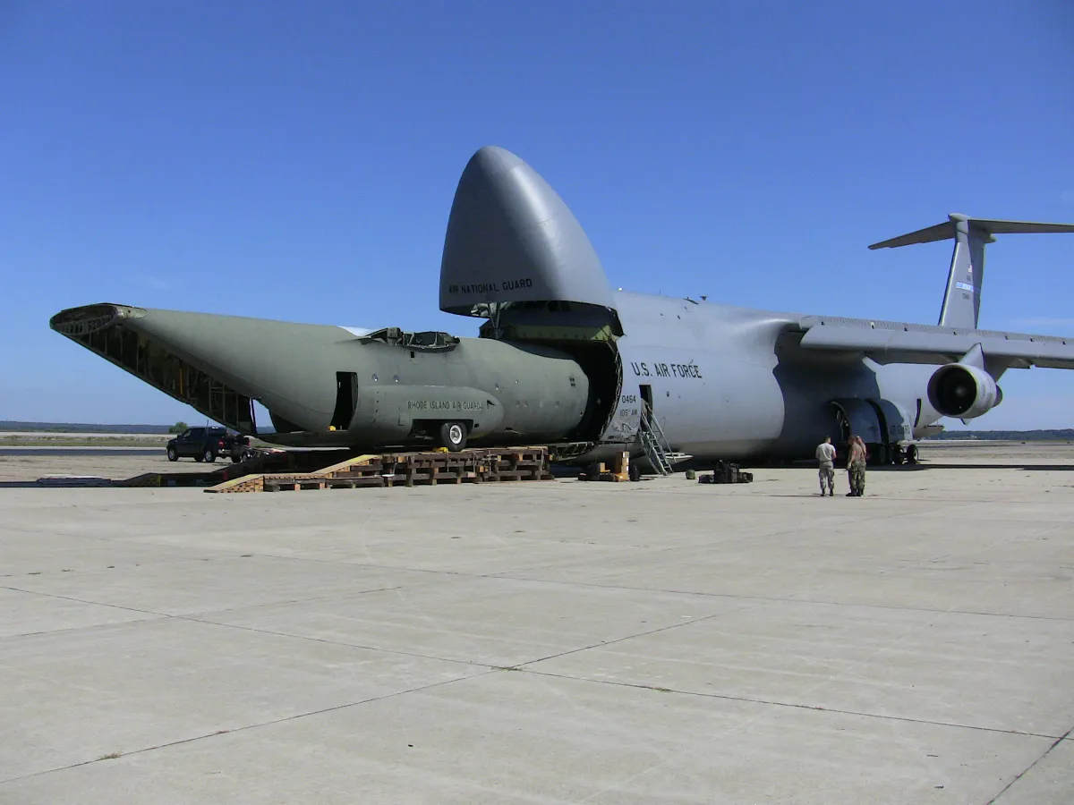 C5 Galaxy eating a C-130 fuselage Blank Meme Template