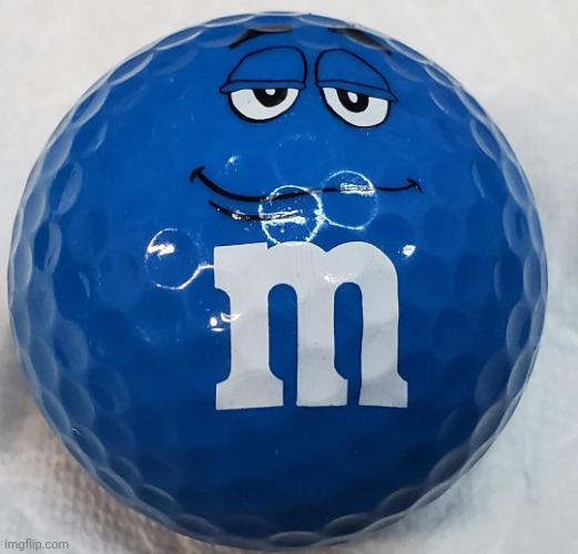 Blue m&m as a golf ball | image tagged in blue m ball | made w/ Imgflip meme maker