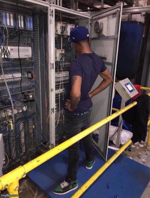 network engineer looking at server rack | image tagged in network engineer looking at server rack | made w/ Imgflip meme maker